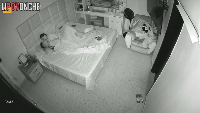 Young people rest together, blind to the secret surveillance (bedroom)