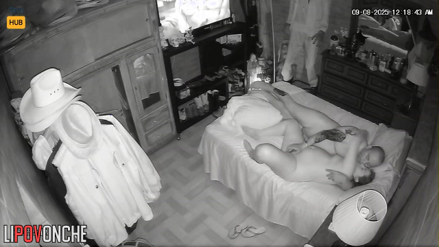 People rest in bed, blind to the secret surveillance