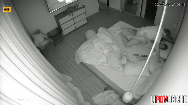 Lovers rest together, blind to the secret surveillance
