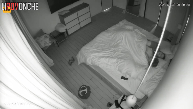 Couple kisses softly, not knowing a lens records their sex life