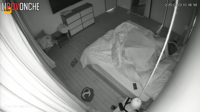Couple kisses softly, not knowing a lens records their sex life
