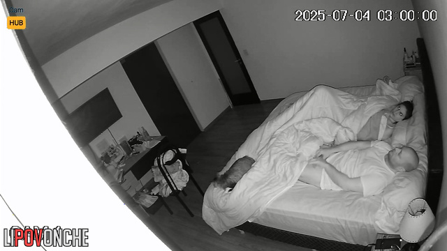 Spouses fucking in bed, not realizing a lens see all
