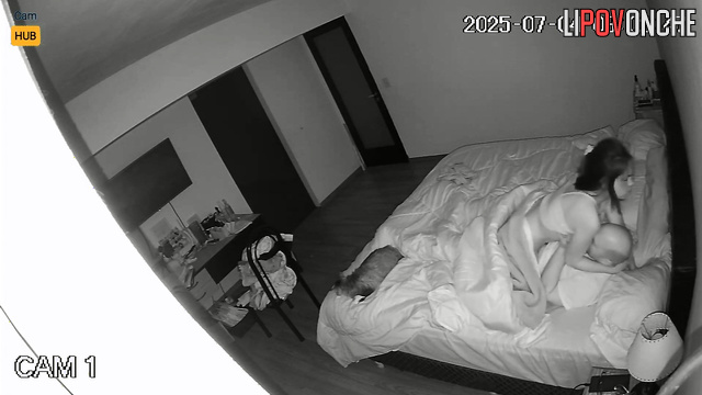 Spouses fucking in bed, not realizing a lens see all