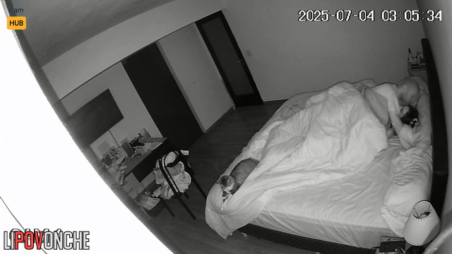 Spouses fucking in bed, not realizing a lens see all