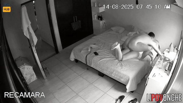 Mexican couple cuddles close, not knowing they are under watch