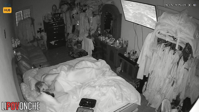 This pair fucks quietly, blind to the secret camera nearby