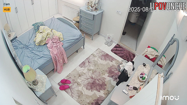Topless brunete is not alone in her bedroom, look