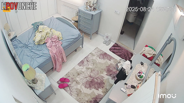 Topless brunete is not alone in her bedroom, look