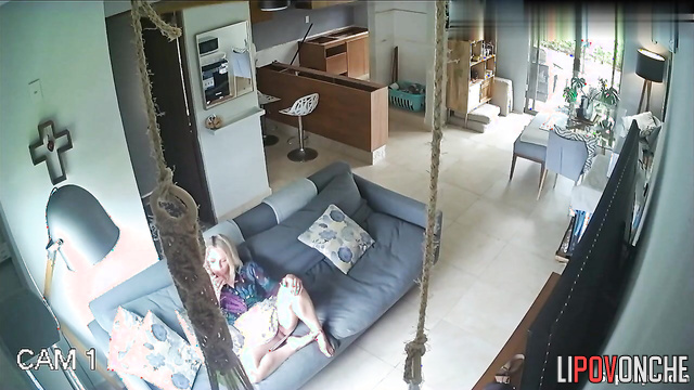 She talking flirtatiously on the phone and masturbating