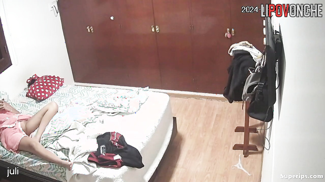 A completely naked beauty ponders what to wear on her date with her lover