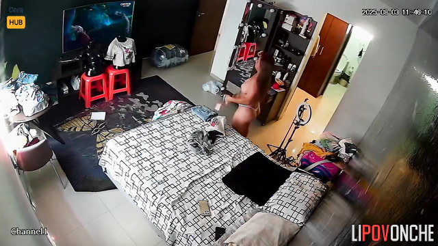 Curvy lady is not actually alone in the room she is being watched