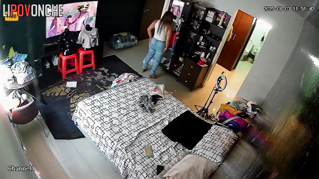 Curvy lady is not actually alone in the room she is being watched