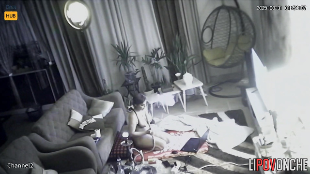 Chubby bitch smoking hookah and caressing her nipples on webcam