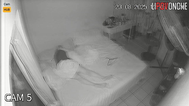 A bored blonde spreads her labia in front of a fan blowing on her cunt