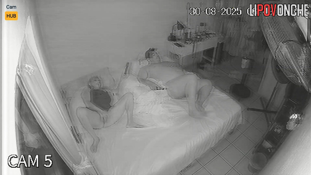 A seductive milf plays with her pussy without being shy in her naked husband's presence