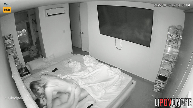 While her bored husband watches a movie,  Colombian wife licks his cock