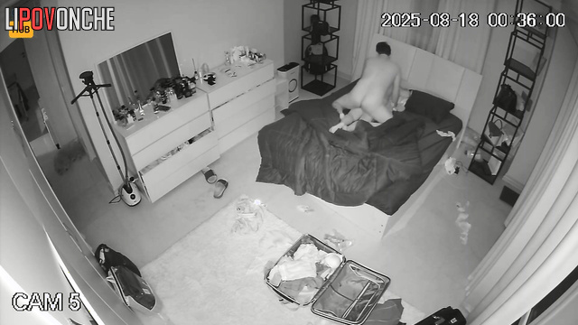 A husband who has returned from a business trip actively fucks his sleeping wife