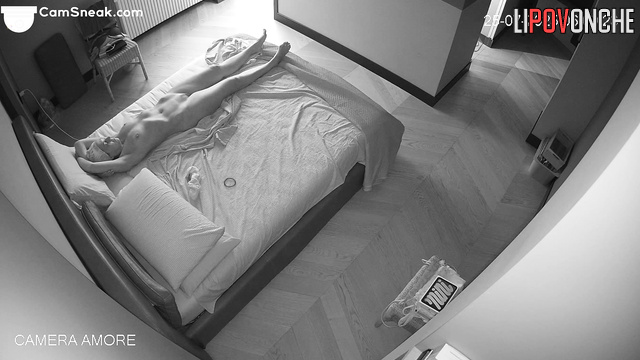 Naked milf relaxing on bed and going to masturbate