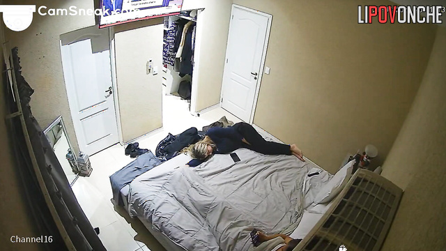 Couple enjoying love, unaware of covert observation, look