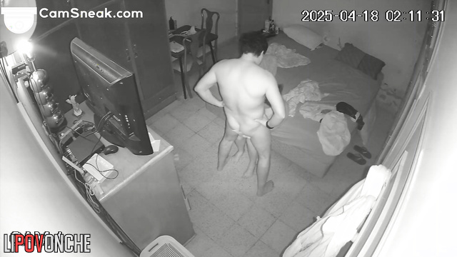 Naked lovers rested in the bed while a stranger watched over them