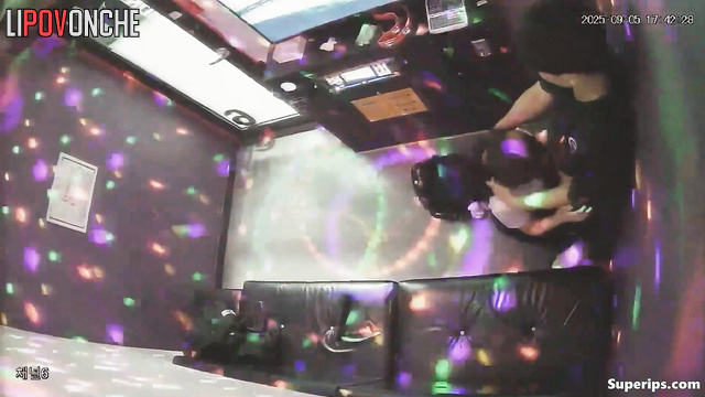 Asian teens together at a karaoke club, they kissing and singing