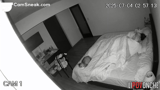 A secret person watches the spouses as she enjoys the cool night