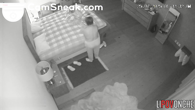 Couple having tender sex, not noticing the intense gaze on their connection