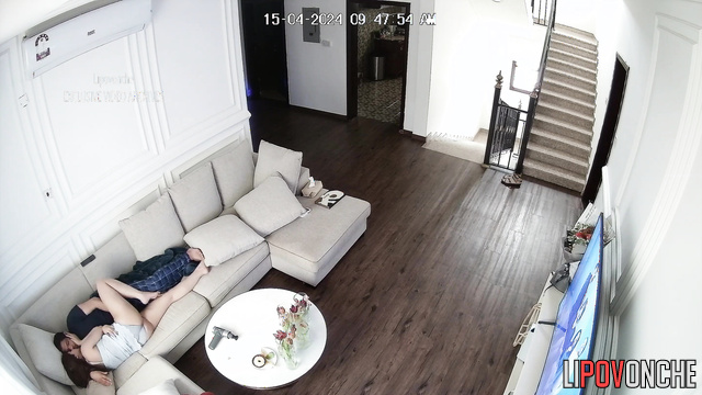 Ex-couple enjoying each other on the huge white sofa