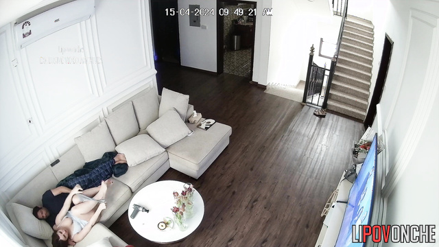 Ex-couple enjoying each other on the huge white sofa