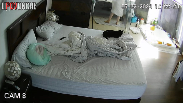 MILF relaxes on bed and takes pictures of her naked body parts