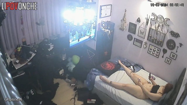 Brunette masturbates with a dildo and watches porn