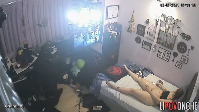 Brunette masturbates with a dildo and watches porn