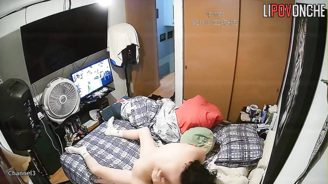 The couple had sex in a cramped bedroom in front of the TV
