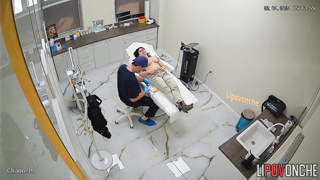 Babe getting beauty procedure topless (doctor enjoying it)