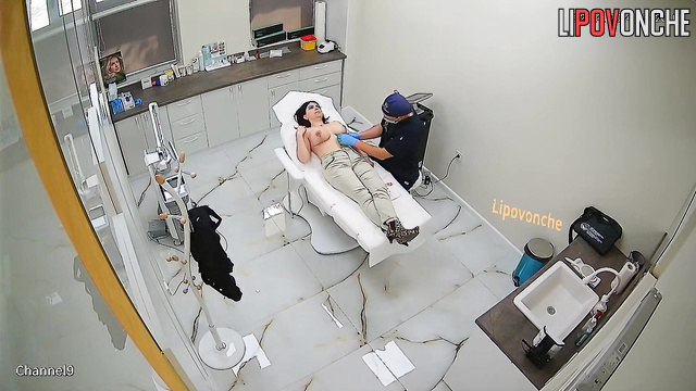Babe getting beauty procedure topless (doctor enjoying it)