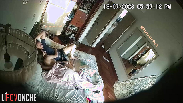 Couple engaging in mutual masturbation on the bed