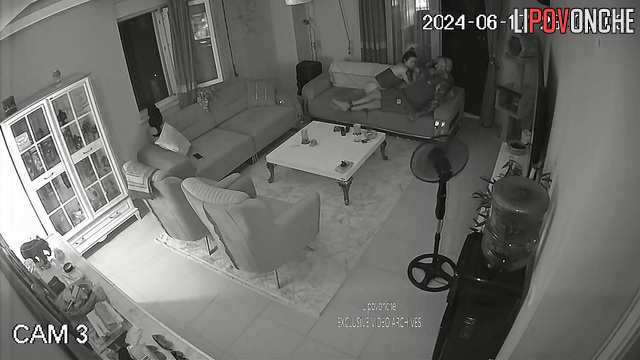 Tattooed couple jerk each other off in the living room