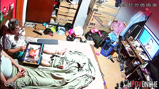 Couple fucking in a dirty room in front of the TV.