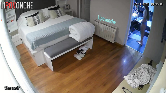 Long-haired girl walking on the flat with thinks about sex