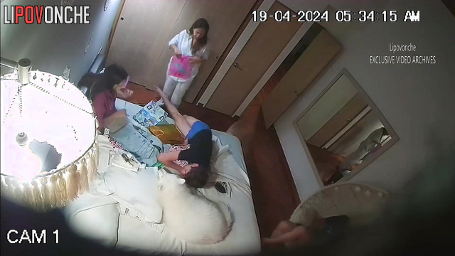 Relative hugging in their bedroom (happy evening tape)