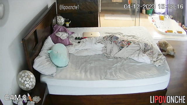 Naked milf with cool tits relaxing on the bed with face mask