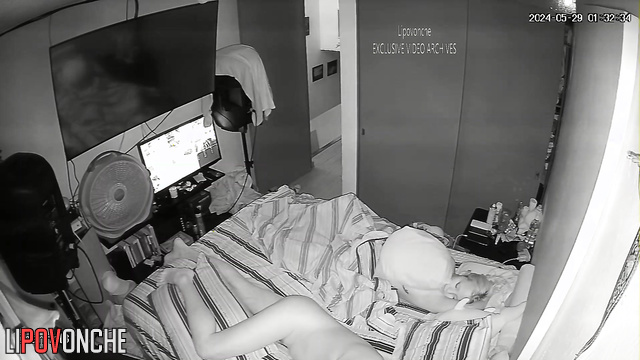 Sleeping people are watched in the bedroom this night