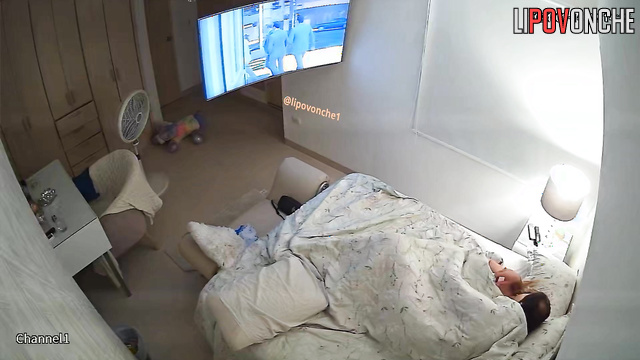 Chubby blonde eating snacks in her warm bed (during tv watching)