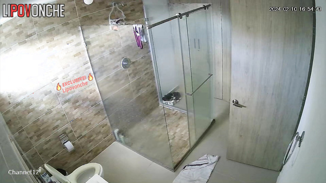 Topless brunette brushing white teeth (bathroom scenes)
