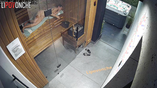 Naked woman relaxing naked in the sauna / hidden video