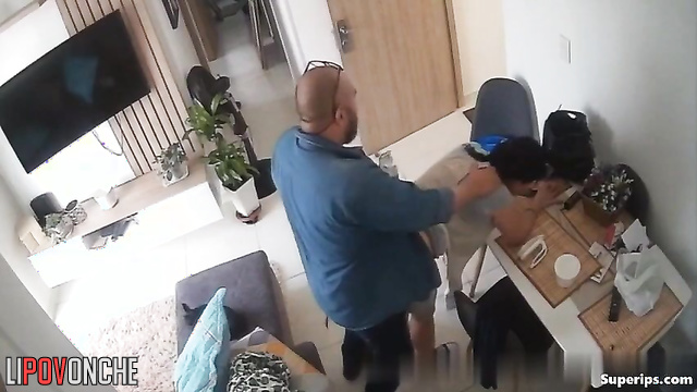 An aroused, bearded man puts his beloved wife in the doggystyle position