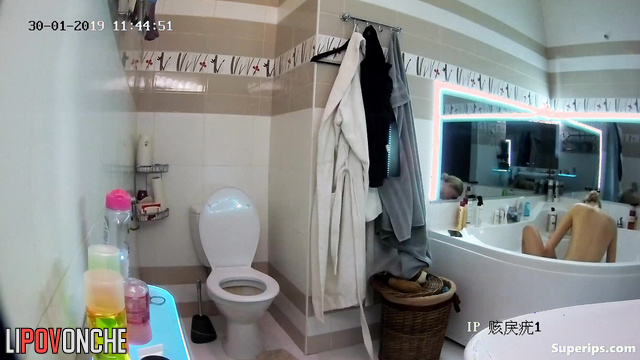 A husband secretly filmed his slender wife taking a bath and using the toilet