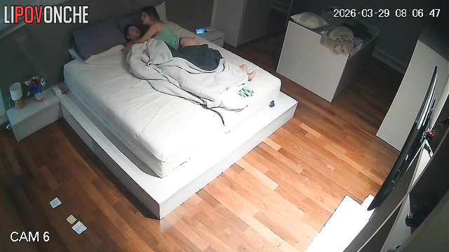 An aroused man is vigorously fucking his slender wife in the mouth