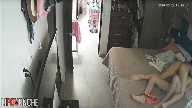 A petite beauty with small tits happily impales herself on her bearded lover's cock