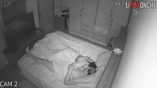 The wife actively jerks off her husband while he gently licks her hard nipples